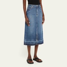 SIMKHAI "Della" denim midi skirt boasts whiskering and a released hem Sits on the natural waist Five-pocket style Front split Hem falls below the knee Straight silhouette Button/zip fly Cotton Dry clean Made in USA Latest Skirts, Knit Maxi Skirt, Stretch Skirt, Hem Skirt, Denim Midi Skirt, Split Hem, Denim Wash, A Line Skirts, Linen Blend