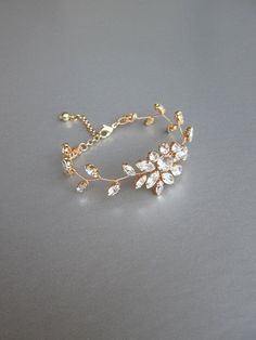 "This delicate floral bracelet is made with beautiful sparkly Swarovski crystals. The bracelet measures 3/4\" wide in the center and it will fit 6\" to 8\" wrist. Available in gold, silver or rose gold finish. - For the matching earrings please take a look here: https://www.etsy.com/listing/203769737/bridal-crystal-earrings-sparkly-crystal?ref=shop_home_active_82 - For the matching headpieces please take a look here: https://www.etsy.com/listing/491338441/swarovski-crystal-bridal-hair-vine?ref=s Floral Engagement Ring, Crystal Belt, Crystal Bridal Earrings, Bracelet Wedding, Swarovski Crystal Bracelet, Swarovski Bracelet, Floral Bracelet, Sparkly Earrings, Wedding Jewelry Bracelets