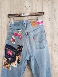 Vintage apcycled Jean's vintage levis | Etsy Bohemian Reworked Denim Jeans, Reworked Recycled Denim Bottoms, High Rise Denim Jeans For Festivals, Denim Blue High Rise Bohemian Jeans, Bohemian High-rise Jeans In Denim Blue, Bohemian High Rise Denim Blue Jeans, Upcycled Straight Leg Denim Jeans, Vintage Reworked Jeans For Spring, Spring Vintage Reworked Jeans