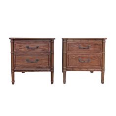 a pair of wooden nightstands sitting next to each other on top of a white background