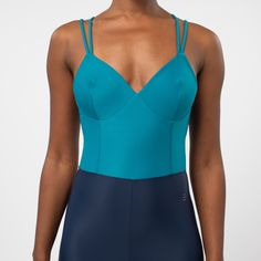 The Westbourne is an elegant one-piece defined by a low-cut neckline with double straps for support.  Tailored bodice with stitching to define waist and elongate the legs.  The Westbourne is both flattering and functional.  Great for workouts involving lots of movement. 78% recycled polyamide / 22% elastane UV protection Shape retention Two-way stretch  Machine wash at 30 degrees Elegant Fitted Swimwear With Removable Straps, Blue Fitted Bodysuit With Spaghetti Straps, Elegant Spaghetti Straps Swimwear, Fitted Underwire Bodysuit With Straps, Fitted Elastane Swimwear With Straps, Elegant Blue Elastane Swimwear, Fitted Blue Swimwear With Tank Straps, One-piece Swimwear With Fitted Bodice And Lined Body, Fitted Bodice One-piece Swimwear