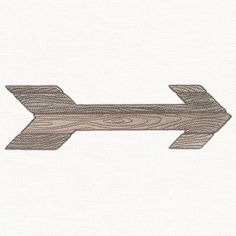 an arrow drawn in wood on a white background