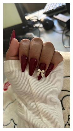 Indulge in the rich, romantic hue of cherry wine nails, perfect for adding a touch of sophistication to any look, day or night. Wine Red Valentine Nails, Cherry Wine Nails Acrylic, Maroon Nails For Prom, Maroon Nails Aesthetic, Marron Red Nails Acrylic, Cherry Wine Nails Design, Almond Nails Valentines Day Red, Maroon Almond Nails Design, Cherry Nail Inspiration