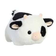 a close up of a stuffed animal cow head on a white background with black spots