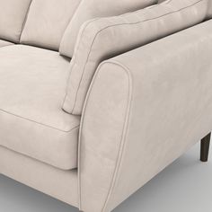 a close up view of a couch with the arms extended and foot rests on it