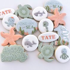 decorated cookies with sea animals and words on them