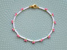 Dainty cherry beaded bracelet, made with 2mm small seed beads. Perfect as a small gift for a loved one.  If you would like the bracelet in a different color, please write me a message, I am happy to make a custom one for you. Each jewelry item comes in a colorful envelope, as seen in the last picture, and is ready to be gifted. You can find the matching necklace here https://www.etsy.com/GirassolBeads/listing/1359959725/ The same bracelet with red cherries https://www.etsy.com/GirassolBeads/list Gift Anklets With Tiny Beads, Summer Gift Beaded Bracelets With Beaded Chain, Summer Gift Beaded Chain Bracelets, Trendy Round Bead Anklets For Gift, Summer Gift Beaded Bracelets, Summer Friendship Bracelets With Heart Beads As Gift, Summer Gift Beaded Bracelets With Heart Beads, Summer Gift Beaded Bracelet With Heart Beads, Dainty Colorful Beads Anklets As A Gift