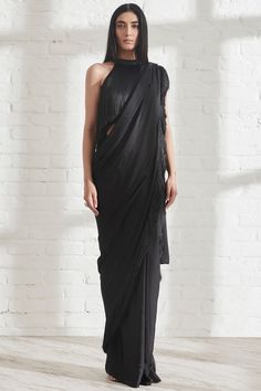 Featuring a black pre-draped saree in hammered satin base with fringe detailing. This contains only one piece.  FIT: Fitted at bust and waist. COMPOSITION: Hammered satin. CARE: Dry clean only. Met Gala Dresses, Sari Design, Top Indian, Drape Saree, Modern Clothing, Fringe Top, Indian Fashion Designers, Black Halter, Halter Neck Top