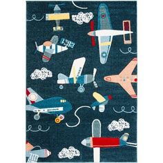 a blue rug with airplanes and planes on it