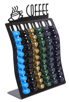 a rack with many different colored beads on it and a sign that says coffee next to it