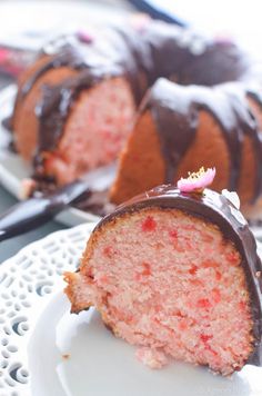 a bundt cake with chocolate frosting on a plate