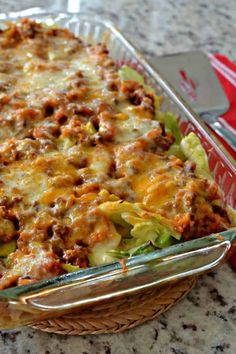 a casserole dish with meat and vegetables in it