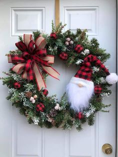 a christmas wreath with a santa clause on it