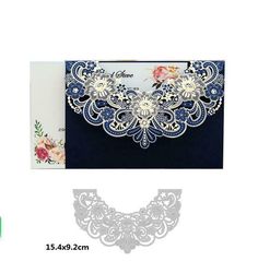 an image of wedding card with lace and flowers on the front, and blue envelope