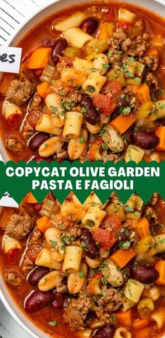 a bowl filled with pasta and vegetables next to a sign that says copycat olive garden pasta