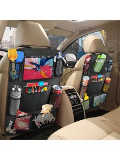 the back seat of a car with various items in it