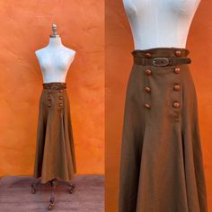 "Amazing skirt! Brown wool lined belted leather buttons Tag:Boutique by Elegance,S.A. Paris EUC Waist: 25.5\" Hip: 49\" Length: 35\"" Fitted Belted Skirt For Fall, Fall Brown Belted Skirt, Brown Fitted Full Length Skirt, Vintage Fitted Skirt With Buttons, Fitted Vintage Skirt With Buttons, Retro Fitted Skirt With Belt Loops, Fitted Vintage Mini Skirt, Vintage Fall Skirt With Buttons, Fitted Vintage Skirt For Vintage Fashion