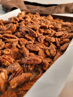 a tray filled with fried food sitting on top of a table