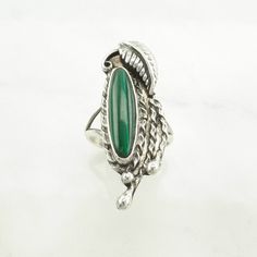 This ring is a size 6 3/4 (USA); It may be resized. Markings: Unmarked (Tested & guaranteed to be Sterling Silver) This ring weighs 6 Grams The Stone/Design is Green Malachite Leaf, Navette   Natural  The Stone/Design measures 20 x 5.3 mm The Ring face measures 37.9 x 13.9 mm The condition of this ring is Estate, Great, moderate patina This vintage item is circa 1980  To have us do the resize, add this listing and the resize listing to your cart and select which size you would like this ring to be on the resize listing which may be accessed through this link: https://www.etsy.com/listing/780307949/simple-silver-ring-resize For more vintage sterling silver rings please visit:  https://www.etsy.com/shop/SilverStarrs925?section_id=13854217 Thank you for viewing my item!  Favorite the store to Elegant Green Malachite Rings, Vintage Green Turquoise Cabochon Ring, Green Malachite Bohemian Jewelry, Unique Silver Malachite Jewelry, Handmade Silver Malachite Rings, The Ring Face, Silver Rings Simple, Vintage Sterling Silver Rings, Stone Design