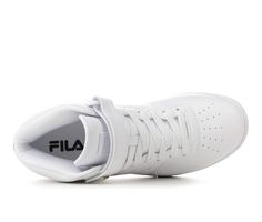 Synthetic leather upper with stitching details, Mid-top design with padded collar and fabric lining, Adjustable Velcro strap and lace-up closure, Classic round toe, Absorbent fabric lined insole, Durable rubber midsole and traction outsole, Fila® branding details | Women's Fila Vulc 13 Mid-Top Sneakers in White Size 10 White Sporty High-top Sneakers With Lace-up Fastening, White High-top Sneakers With Lace-up Fastening For Streetwear, White High-top Sneakers With Lace-up Fastening, White Sporty Sneakers With Front Lace-up, White Sporty Lace-up Sneakers, Casual White High-top Sneakers With Lace-up Fastening, Womens Basketball Shoes, Top Sneakers Women, Mid Top Sneakers