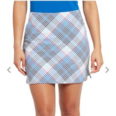 Gingham - Nautical Blue Golf Skort. Hydro-Dry Technology To Wick Away Moisture And Keep Skin Cool. Built-In Undershorts For Extra Coverage. Two Front Slant Hip Pockets, One Back Welt Pocket. Fabric - 85% Polyester, 15% Spandex. 33 1/2" Waist 43 1/2" Hip 31" Inseam. Bin# 04 - Bag# 0025 Golf Skorts, Golf Skort, Skorts, Gingham, Halter Dress, Nautical, Pencil Skirt, Sleeveless Dress, Top Brands