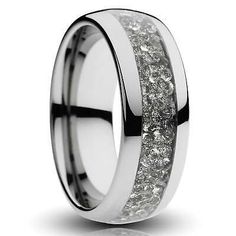 men's wedding band with white diamonds inlayed into the center, on an 18k white gold ring