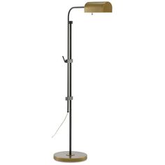 a floor lamp with a wooden base and a metal arm