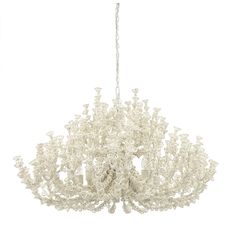 a white chandelier hanging from the ceiling