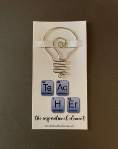 a brochure with some type of lightbulb on it and the words teach here