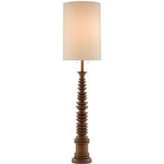 a wooden lamp with a white shade on it's base and a light bulb in the middle