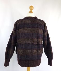 A beautiful chunky wool sweater, hand loomed in Ireland.  Size: XL  Chest: 46" Pit to pit: 23"  Pit to cuff: 21" Collar to cuff: 28" Length: 26.5" It is in lovely condition and comes from a smoke free home.  Please do contact us for more information or if you would like to combine postage on multiple items. Casual Brown Jacquard Knit Sweater, Retro Brown Wool Sweater, Brown Argyle Sweater, Brown Long Sleeve Argyle Sweater, Vintage Brown Wool Cardigan, Pullover Sweater Men, Chunky Wool, Pullover Men, Hand Loom