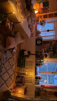 an overhead view of a living room with lights on the ceiling and bookshelves