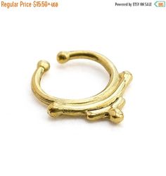 ON SALE. Indian style Fake Brass Septum Ring. by Umanativedesign Adjustable Nickel-free Septum Ring, Adjustable Round Bohemian Nose Rings, Bohemian Gold Nose Rings Nickel Free, Bohemian Gold Septum Ring For Festivals, Bohemian Gold Nose Rings For Festival, Bohemian Hoop Septum Ring As Gift, Gold Bohemian Nickel-free Nose Ring, Bohemian Adjustable Septum Ring As Gift, Handmade Gold Bohemian Septum Ring