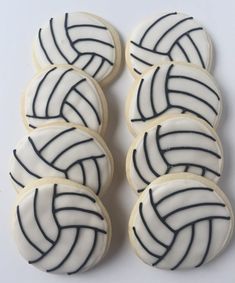 decorated cookies with black and white stripes on them