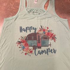 a tank top with the words happy camper on it