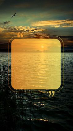 an image of the sun setting over water