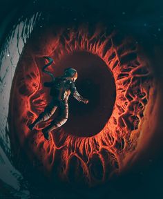 an advertisement for the movie adrenal, with a man floating in front of a giant eye