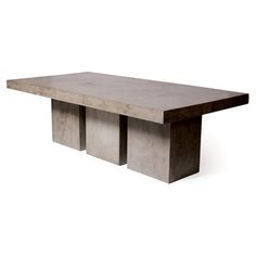 a concrete table with three square sections on each end and one rectangular section at the top