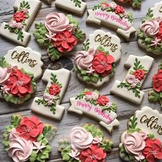 decorated cookies are arranged on a wooden table