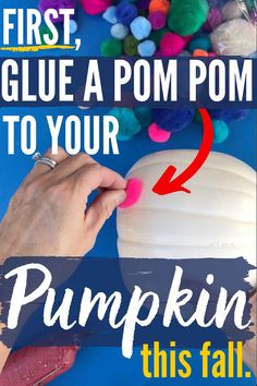 someone is decorating a pumpkin with pom - poms on it and the words, first glue a pom pom to your pumpkin this fall