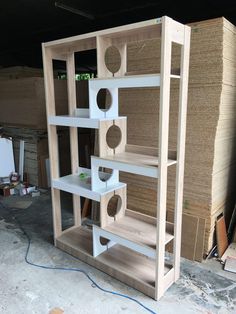 the shelves are made out of plywood and have holes in them to hold items