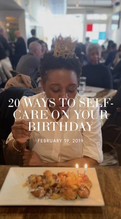 a woman sitting at a table in front of a plate with food on it and the words 20 ways to self care on your birthday