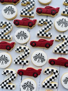 decorated cookies with race cars and numbers on them