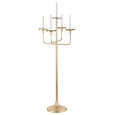 a tall brass candle holder with five candles on each side and four smaller candles in the middle