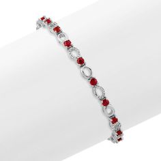 Ruby and Diamond Link Bracelet (7 in) Red Round Bracelets With Diamond Accents, Red Bracelets With Diamond Accents, Red Diamond Oval Bracelet, Red Oval Diamond Bracelet, Red Oval Diamond Gemstone Bracelet, Red Diamond Oval Tennis Bracelet, Red Oval Diamond Classic Bracelet, Red Oval Tennis Bracelet Fine Jewelry, Red Oval Tennis Bracelet For Anniversary