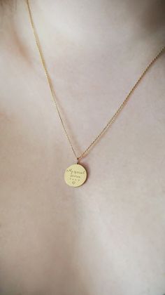 14mm 14K 9K Handwriting Charm Necklace, Personalized Handwritten Pendant, Engraved Disc Necklace, Custom Handwriting Jewelry, Solid gold layering necklace, BFF Gift, Gift for her, FREE EXPRESS SHIPPING Dainty solid gold disc charm necklace engraved with YOUR handwritten message. A personal and beautiful gift for every occasion! ------------------------------------------- D E T A I L S 14K Solid Gold or 9K Solid Gold Disc diameter: 14mm Personalized Handwriting - Both sides can be engraved - Plea Everyday Engraved Gold Plated Charm Necklaces, Everyday Engraved Gold Plated Charm Necklace, Everyday Gold Plated Engraved Charm Necklaces, Gold Sterling Silver Charm Necklaces With Engraving Option, Gold Heart Pendant Necklace With Hallmarks, Elegant Memorial Necklaces With Hallmarks, 14k Gold Engraved Round Disc Jewelry, Gold Charm Necklace With Engraving Option, Engraved 14k Gold Custom Necklace With Round Pendant