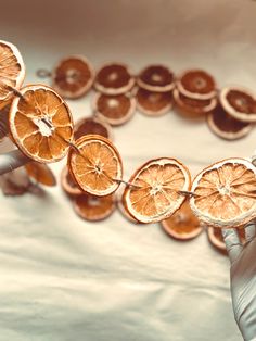 an orange slice is being cut into pieces