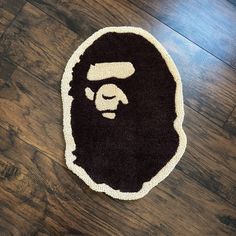 a black and white rug with a gorilla face on it