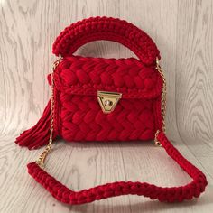 Any woman must have this bag for every fashionista. Whether you keeping it to yourself or gifting someone you care, it will be unforgettable. ✅I made this beautiful bag from handmade Premium T-shirt yarn (100% cotton) using the crochet method. ✅Suitable for use as handbag, make-up bag or party bag ✅You can combine your clothes with a bag on summer/spring/winter days ✅It will complete your elegance with daily and evening clothes. ✅This designer bag is large enough to accommodate many accessories Handmade Red Shoulder Bag For Parties, Red Crochet Tote Bag For Gift, Red Crochet Tote Bag As Gift, Red Crochet Pouch Bag For Gift, Chic Red Crochet Bag For Everyday Use, Red Crochet Pouch Bag, Chic Red Crochet Tote Bag, Elegant Knitted Rectangular Shoulder Bag, Handmade Red Top Handle Shoulder Bag