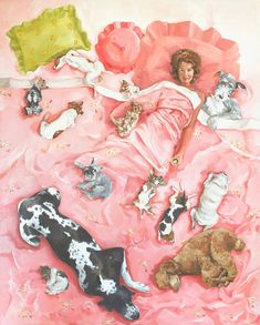 a woman laying on top of a bed covered in lots of cats and other animals